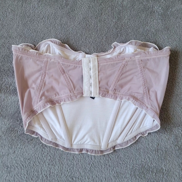 out from under pastel pink and white corset top - Picture 2 of 4